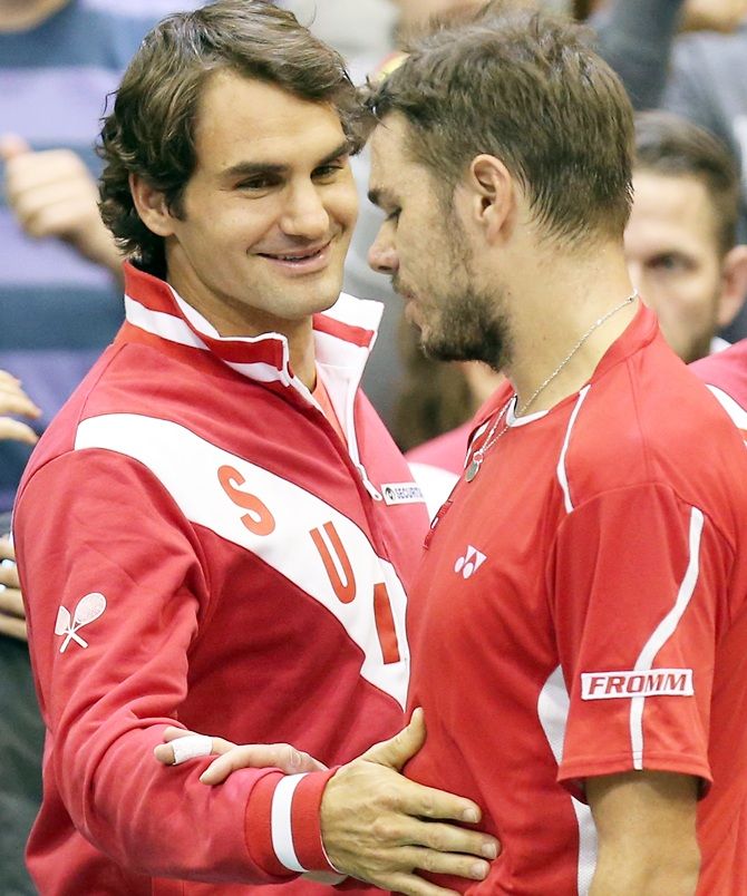 Roger Federer, left, with Stanislas Wawrinka of Switzerland
