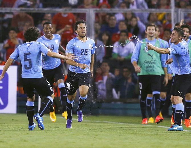 Alvaro Gonzalez of Uruguay celebrates with his teammates after scoring a goal