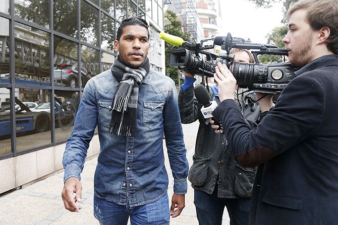 French football club Bastia's player Brandao leaves after a hearing at the French Football Federation (FFF) headquarters in Paris on November 4, 2014