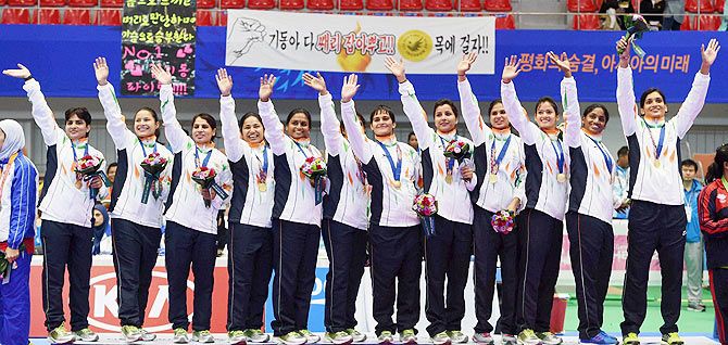 Gold medal winning Indian womens Kabaddi team pose during the award ceremony at the 17th Asian Games in Incheon on Friday