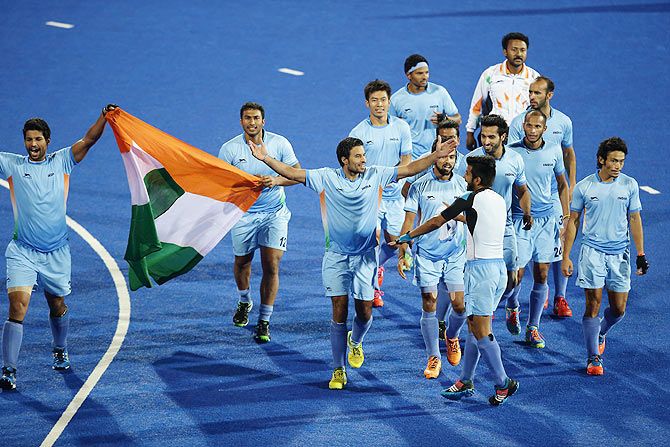 India players celebrate after defeating Pakistan to win the men's hockey gold medal at the 2014 Asian Games