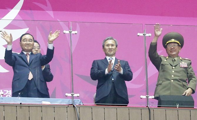South Korea's Prime Minister Jung Hong-won) left, former South Korean minister for national defense Kim Kwan-jin and North Korea's Hwang Pyong So, right, a senior aide North Korea's leader Kim Jong Un