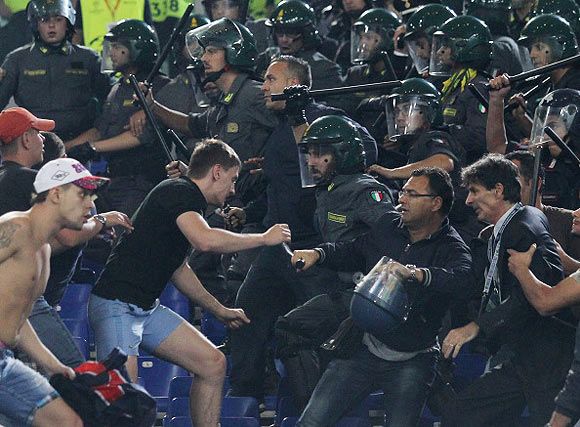 FC CSKA Moskva Fans fight with Police during the UEFA Champions League Group E match between AS Roma and PFC CSKA Moskva on September 17, 2014 