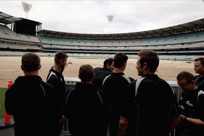 Players look on during a visit to Melbourne Cricket Ground as part of preparations for the ICC 2015 Cricket World Cup