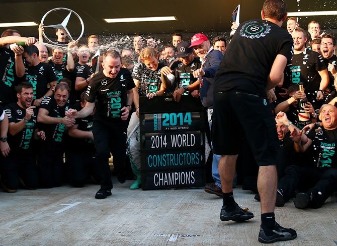The Formula One constructors' world championship trophy found a new   home just down the road from Red Bull's factory in England on Sunday as Mercedes celebrated a   historic first for their 'Silver Arrows' team