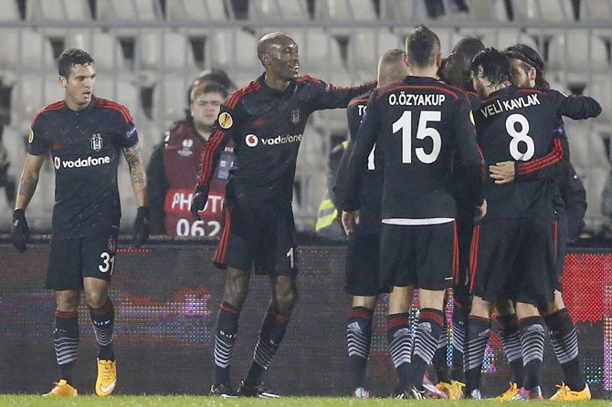 Demba Ba of Besiktas celebrates with his teammates after scoring against Partizan Belgrade during their Europa League Group C match in Belgrade on Thursday