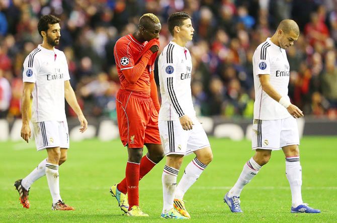 Mario Balotelli of Liverpool walks off dejectedly after their UEFA Champions League match against and Real Madrid on Wednesday