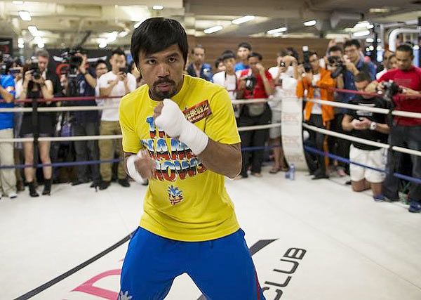 Manny Pacquiao of the Philippines trains during a media workout in Hong Kong on Monday