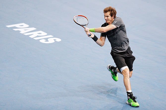 Andy Murray of Great Britain in action against Julien Benneteau of France