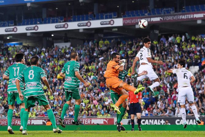Raphael Varane of Real Madrid CF scores his team's second goal during the Copa Del Rey Round of 32 first leg match at Power8 Stadium