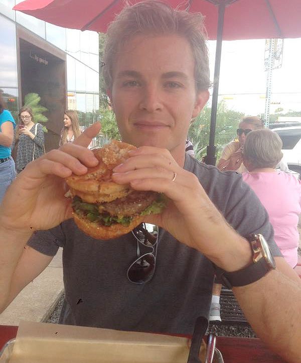 Nico Rosberg chomps on a burger in Austin, Texas