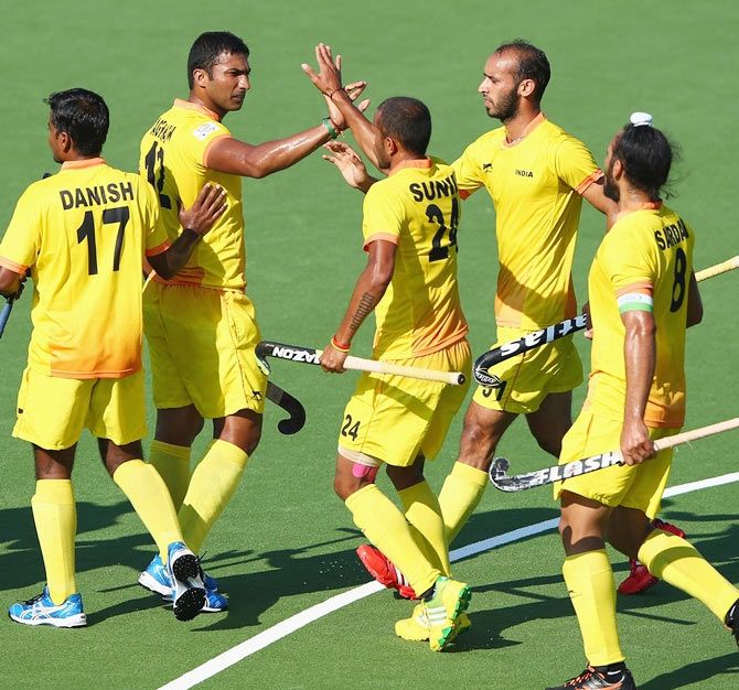 VR Raghunath of India celebrates after scoring from a penalty corner during the Mens Hockey match between India and Wales 