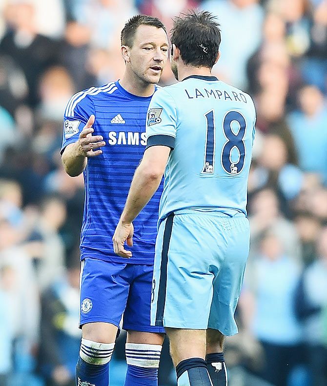 Chelsea's John Terry greets Manchester City's Frank Lampard