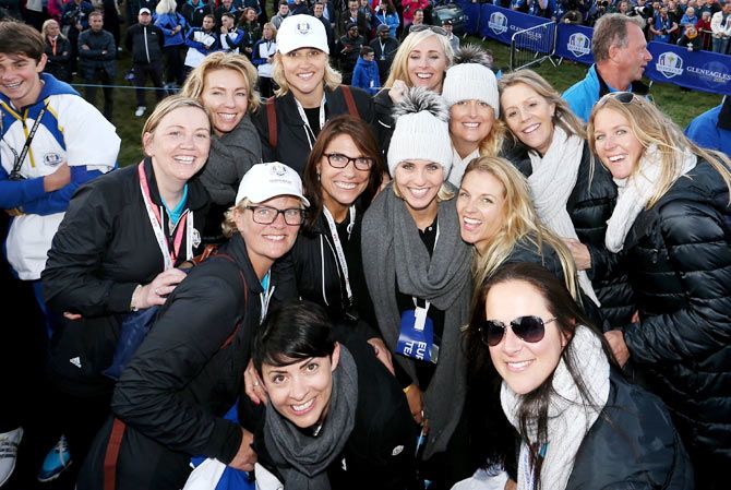 Wives and partners of the Europe Ryder Cup team, Helen Gallacher, Allison McGinley, Pernilla Bjorn, Laurae Westwood, Emma Stenson, Suzanne Torrance, Katharina Boehm, Caroline Harrington, Katie Poulter, Kate Rose, Kathryn Tagg, Vicki Smyth and Susanne Jimenez, pose during the Singles Matches