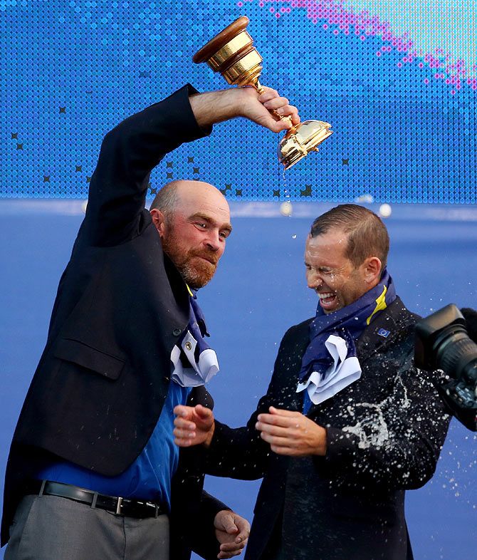 Thomas Bjorn and Sergio Garcia of Europe celebrate winning the Ryder Cup after the Singles Matches 