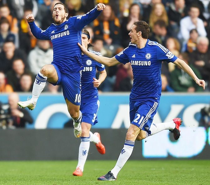 Eden Hazard of Chelsea, left,celebrates
