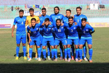 The Indian football team pose before their match