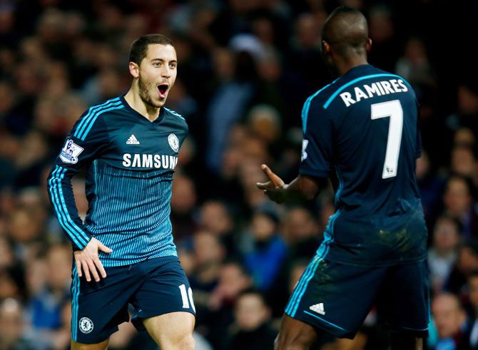 Eden Hazard of Chelsea celebrates with teammate Ramires after scoring