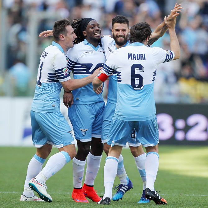 Lazio's Antonio Candreva (2nd from right) celebrates with teammates after scoring the team's third goal during their Serie A match against Empoli FC at Stadio Olimpico in Rome on Sunday