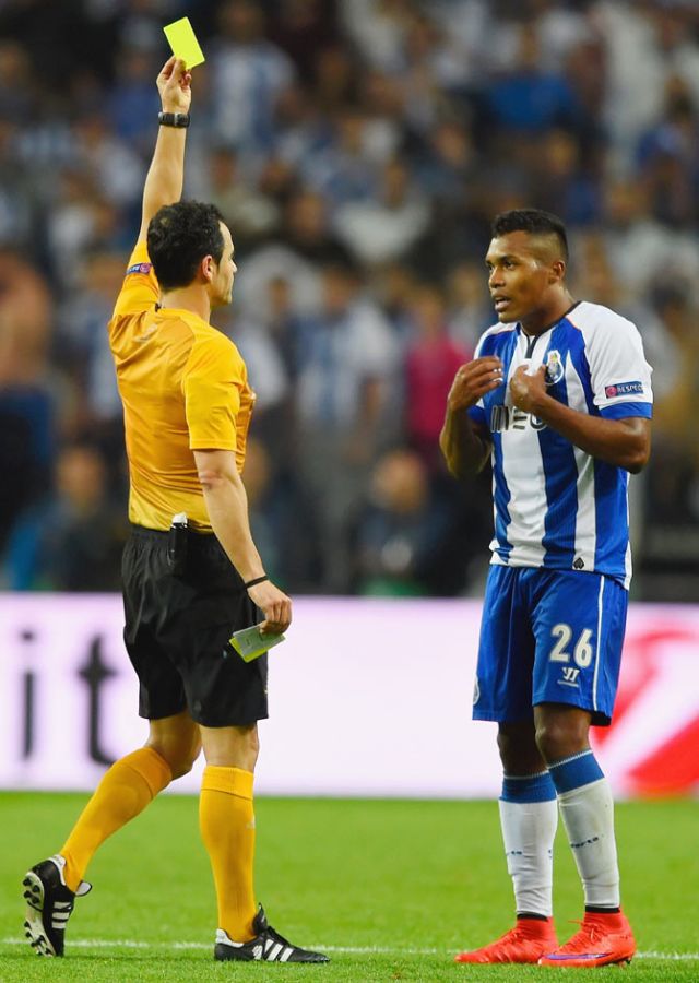  Referee Carlos Velasco Carballo shows a yellow card to Alex Sandro of FC Porto during the UEFA Champions League quarter-final first leg match against FC Bayern Muenchen at Estadio do Dragao in Porto last week