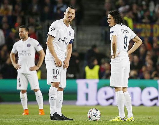 PSG's Zlatan Ibrahimovic, Edinson Cavani and Yohan Cabaye look dejected after Neymar (not pictured) scored the second goal for Barcelona during their UEFA Champions League quarter-final second leg match at Nou Camp on Tuesday