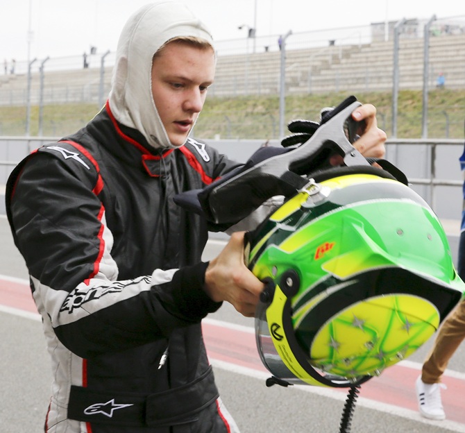 Van Ammersfoort Formula Four driver Mick Schumacher of Germany takes off his helmet