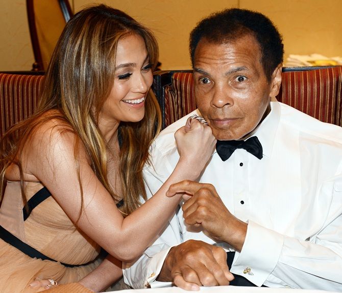 Singer Jennifer Lopez and boxer Muhammad Ali 