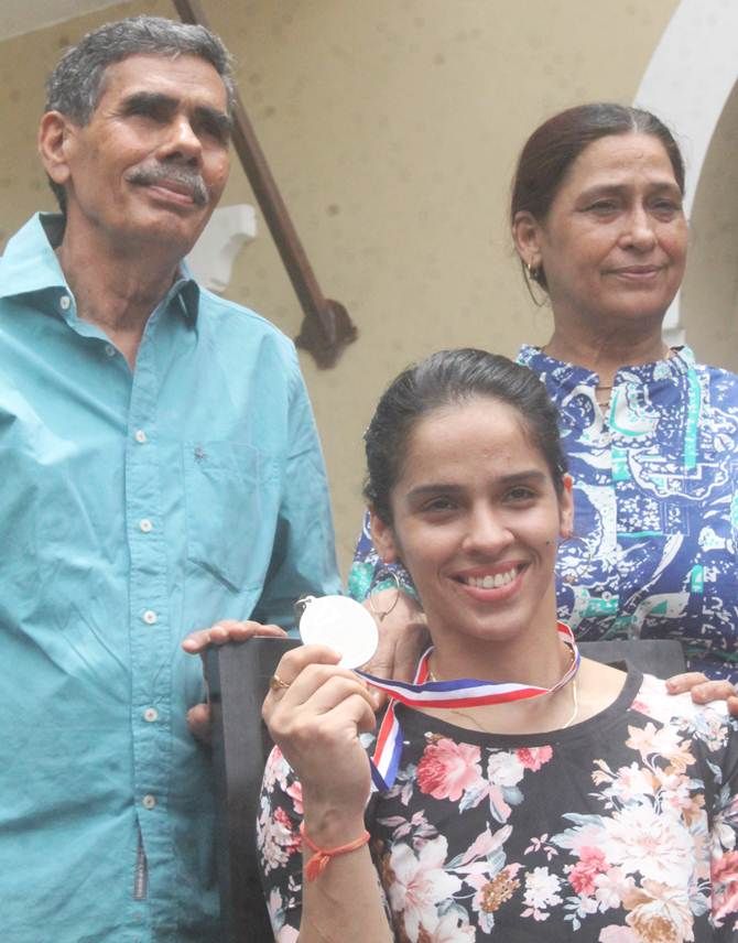 Saina Nehwal with her parents