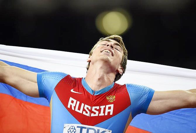 Russia's Sergey Shubenkov celebrates after winning the men's 110 metres hurdles final during the 15th IAAF World Championships at the National Stadium in Beijing, on Friday