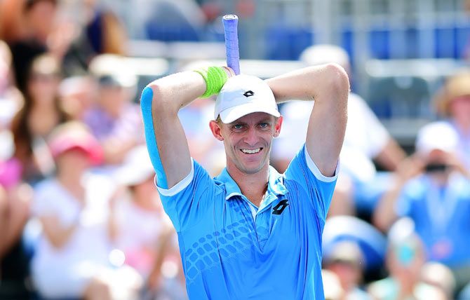 South Africa's Kevin Anderson celebrates after defeating Frenchman Pierre-Hugues Herbert in the men's final of the Winston-Salem Open at Wake Forest University in Winston-Salem, North Carolina on Saturday
