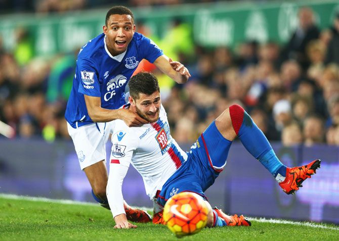 Crystal Palace's Joel Ward is challenged by Everton's Brendan Galloway