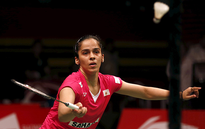India's Saina Nehwal returns a shot  