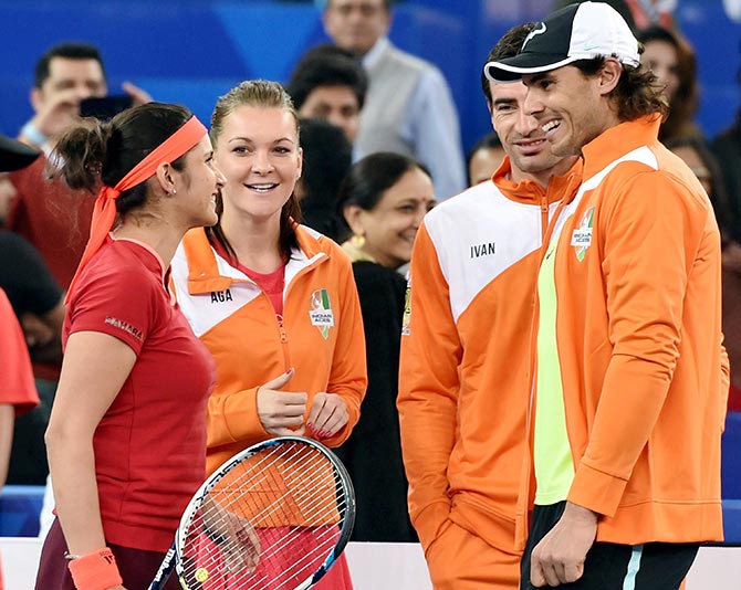 India's Sania Mirza being greeted by Rafael Nadal 