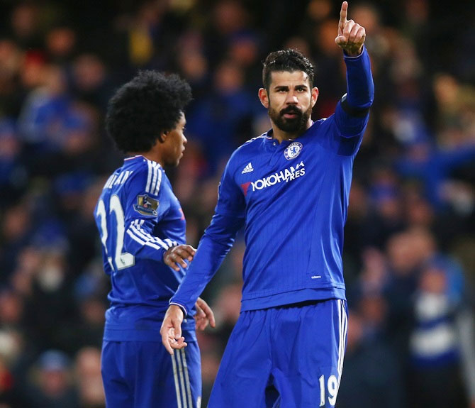 Chelsea's Diego Costa, right, celebrates scoring his team's goal with teammate Willian