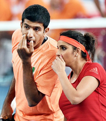 Indian Aces' Sania Mirza and Rohan Bopanna during their mixed-doubles match