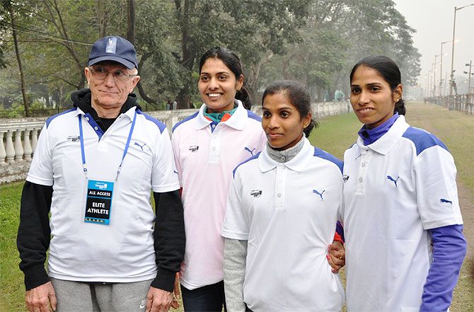 Coach Nikolai Snesarev, (Left to Right), Lalita Babar, O P Jaisha and Sudha Singh.