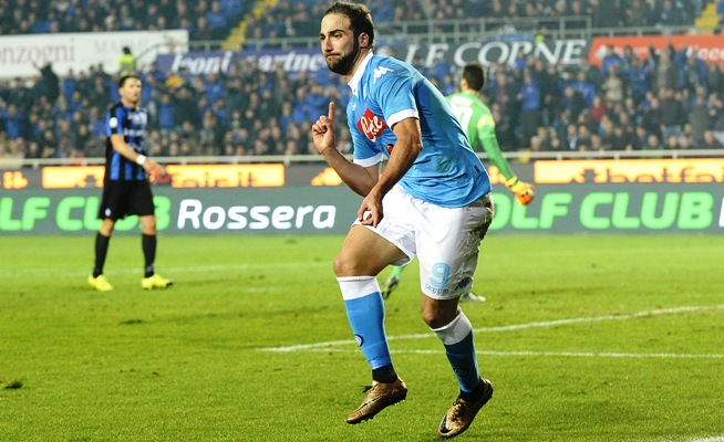 Gonzalo Higuain celebrates after scoring the third goal for Napoli 