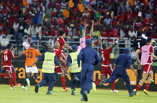 Equatorial Guinea players celebrate after winning their quarter-final match 