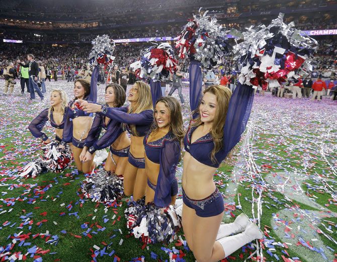 New England Patriots cheerleaders celebrate after their team defeated the Seattle Seahawks in the NFL Super Bowl XLIX football game in Glendale, Arizona on Sunday
