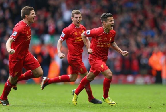 Philippe Coutinho of Liverpool celebrates scoring