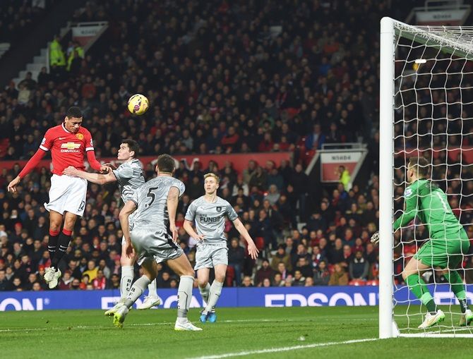 Chris Smalling of Manchester United scores his second goal