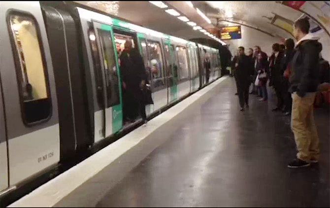 A video grab of Chelsea fans pushing a black man off a train in Paris