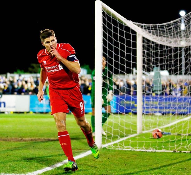 Steven Gerrard of Liverpool celebrates after scoring the opening goal