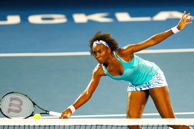 Venus Williams of the USA plays a forehand