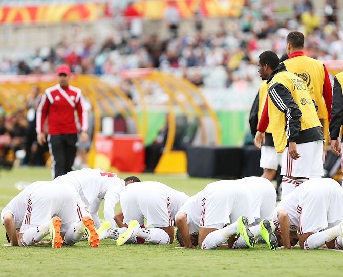 United Arab Emirates players celebrate a goal 