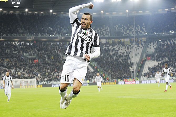Carlos Tevez of Juventus celebrates after scoring against Hellas Verona during their Italian Serie A match at Juventus Stadium in Turin on Sunday
