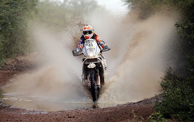 KTM rider Emanuel Gyenes of Romania rides during the 12th stage of the Dakar Rally 2015 from Termas de Rio Hondo to Rosario on January 16