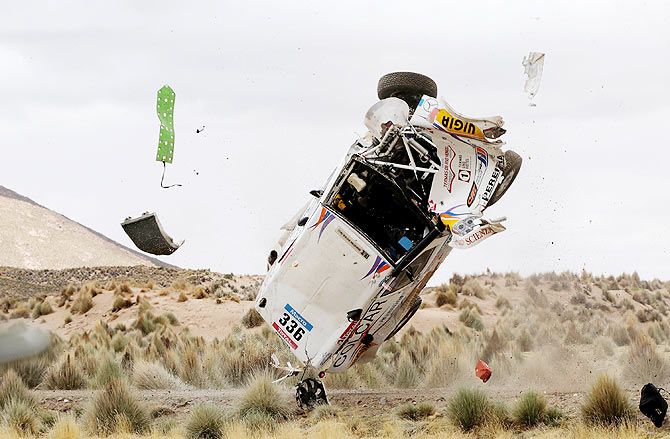Juan Manuel Silva and Pablo Sisterna of Argentina crash in their Mercedes car during the 7th stage of the Dakar Rally from Iquique to Uyuni, Bolivia on January 10