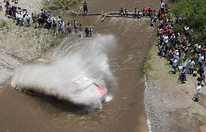 Toyota driver Bernhard Ten Brinke of the Netherlands crosses a river during the 11th stage of the Dakar Rally 2015 from Cachi to Termas de Rio Hondo, Argentina on January 15