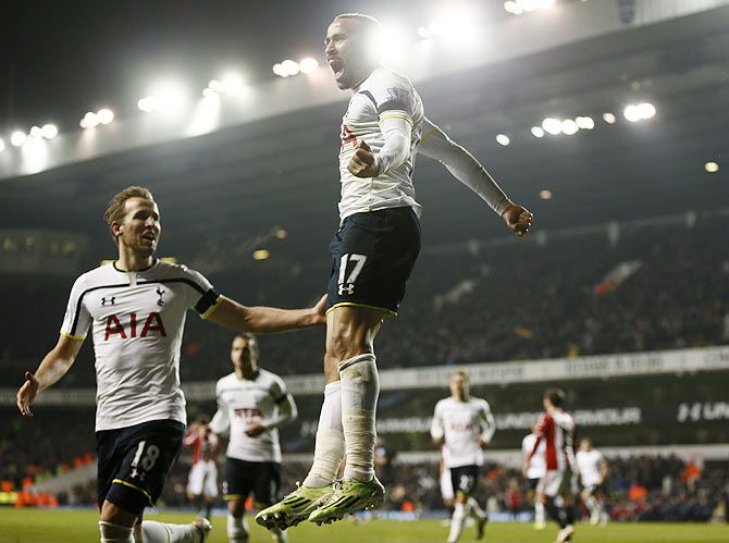 Tottenham Hotspur's Andros Townsend (right) celebrates with Harry Kane after scoring a penalty against Sheffield United during their English League Cup semi-final first leg match at White Hart Lane in London on Wednesday